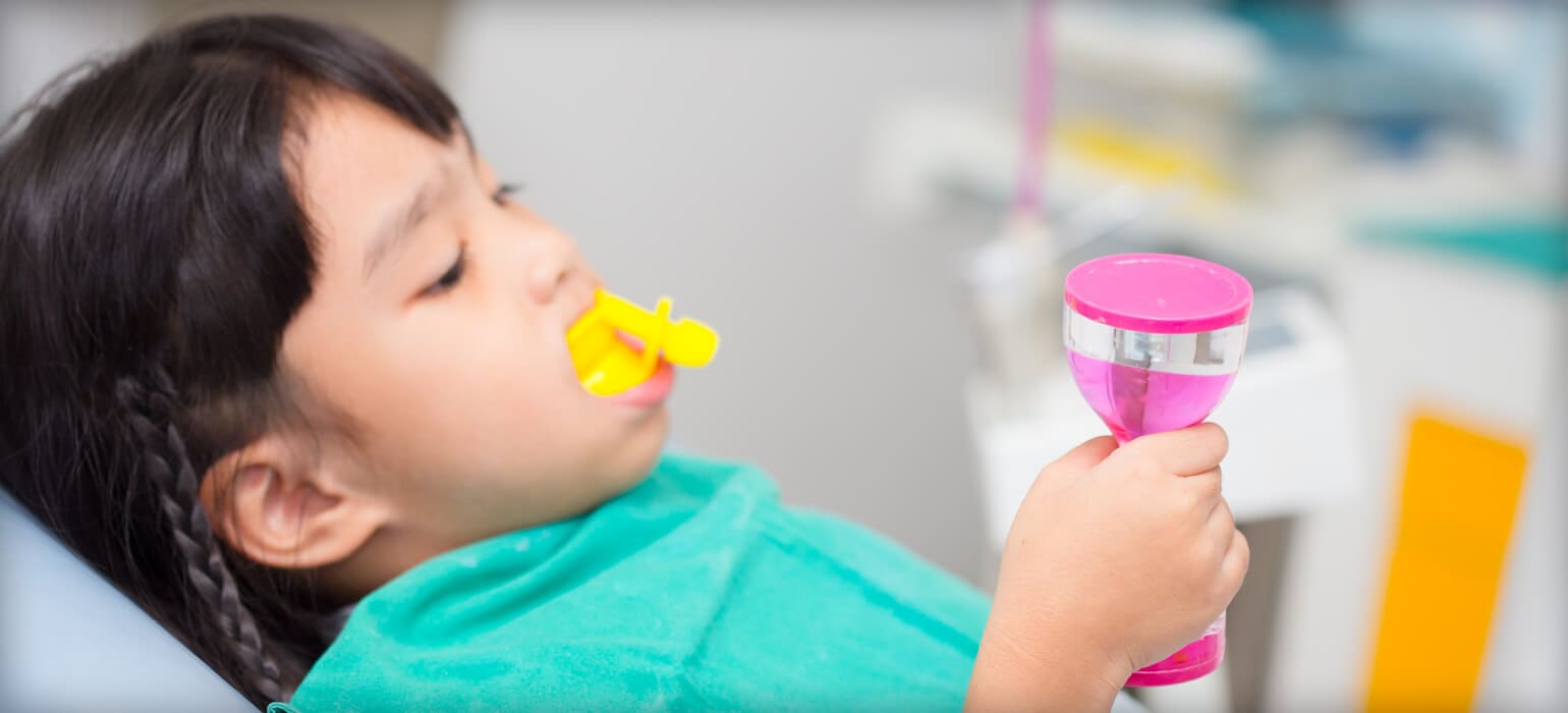 child getting dental care