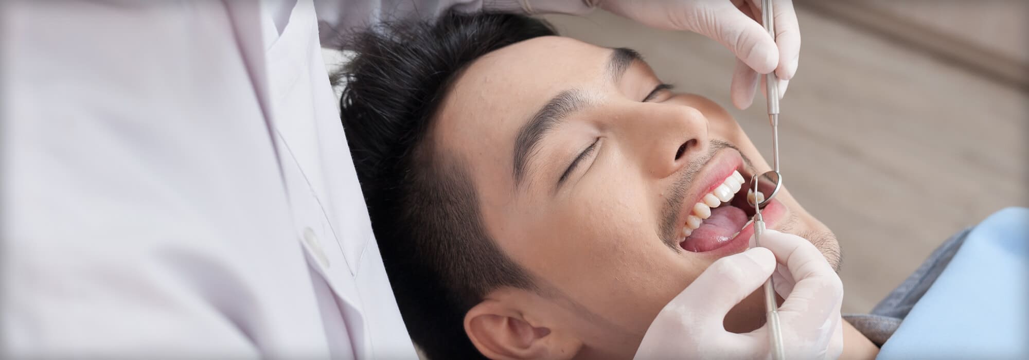man getting dental exam
